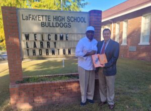 Photo of Larry and Chambers County Personnel